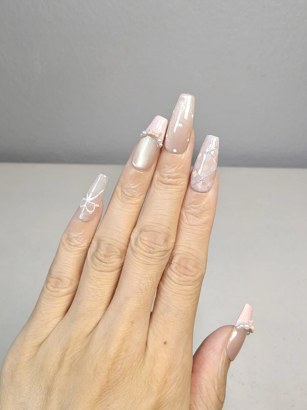 Nude‑Pink Long Coffin Press On Nails With Pink Bows Pearls & Polka Dot